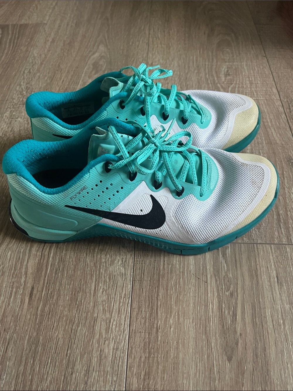 Nike Women’s Teal/White Athletic Training Shoes with Black Swoosh